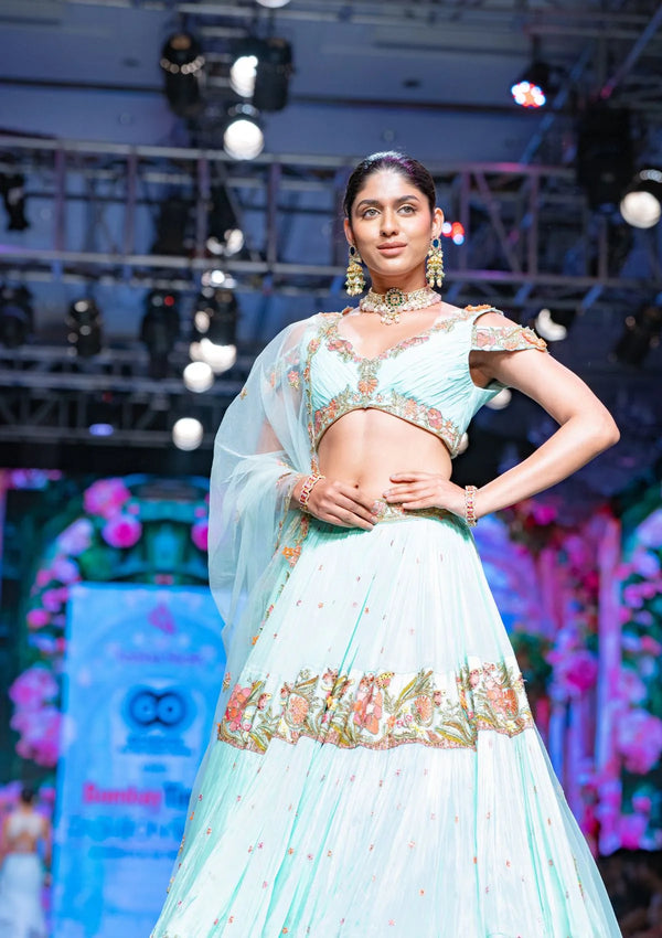 The Hummingbird Gardenia Tiered Lehenga Set In Aqua Green