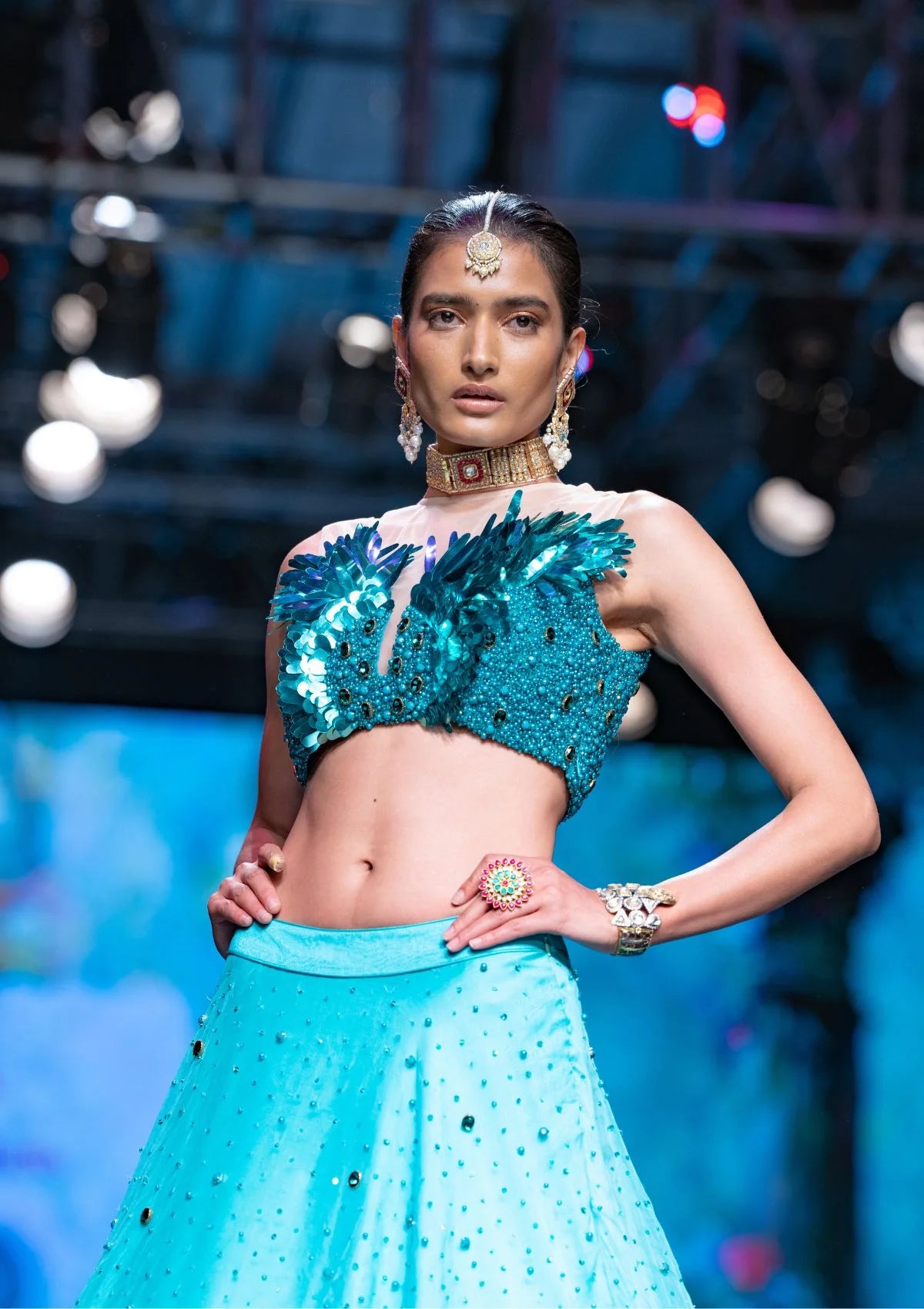 The Dawn Lehenga And Metalic Feather Sequence Crop Top Set In Teal Blue