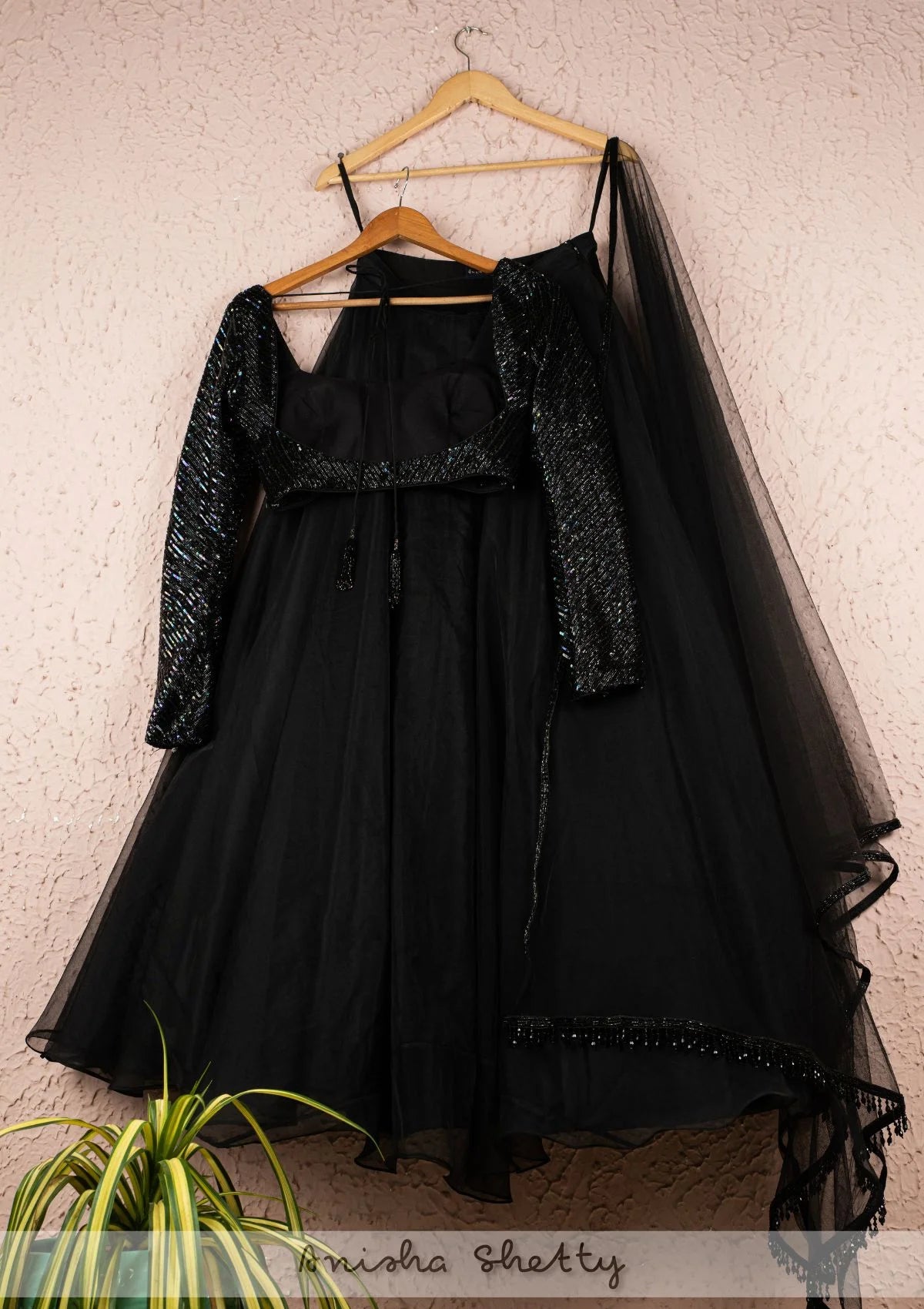Jade Black Organza Lehenga With Full Sleeve Sequence Blouse And Tassel Dupatta