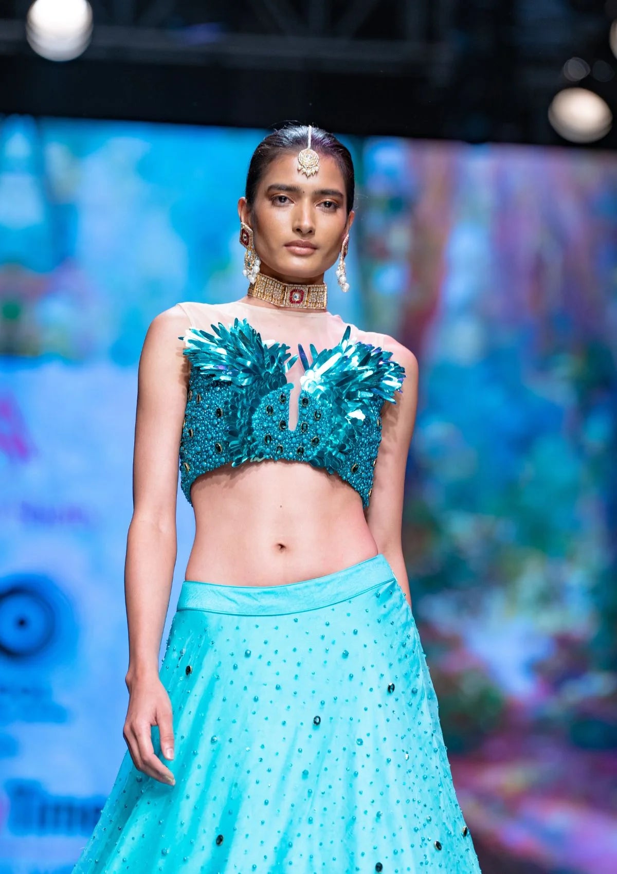 The Dawn Lehenga And Metalic Feather Sequence Crop Top Set In Teal Blue