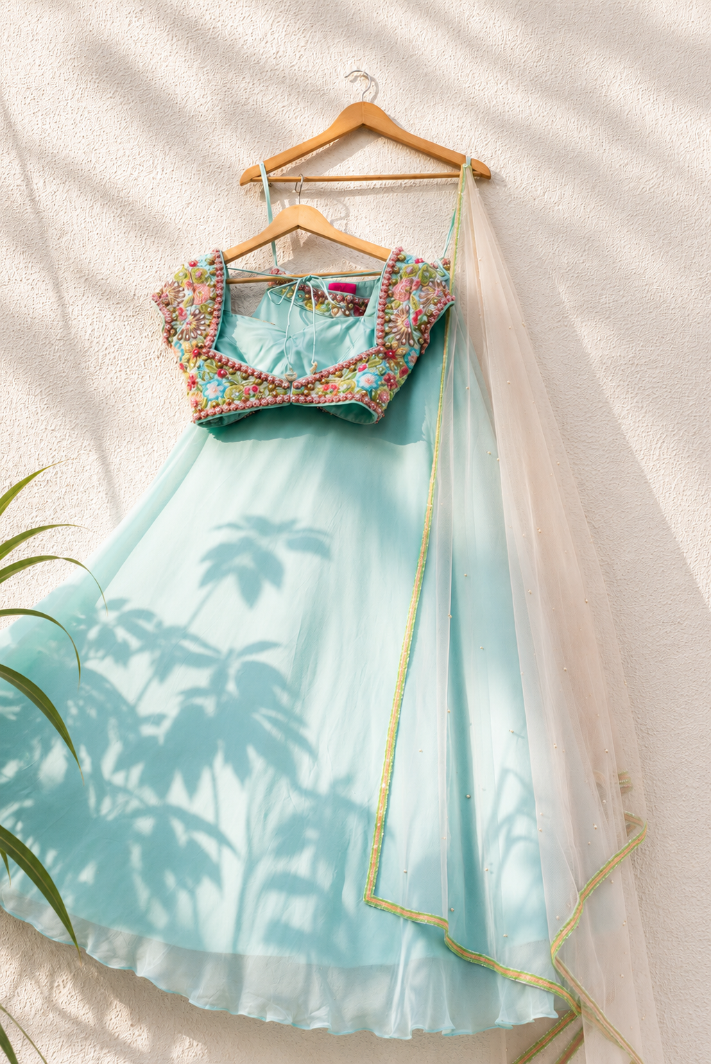 SKY BLUE GOERGETTE LEHENGA WITH COLORED EMB BLOUSE AND PINK DUPATTA