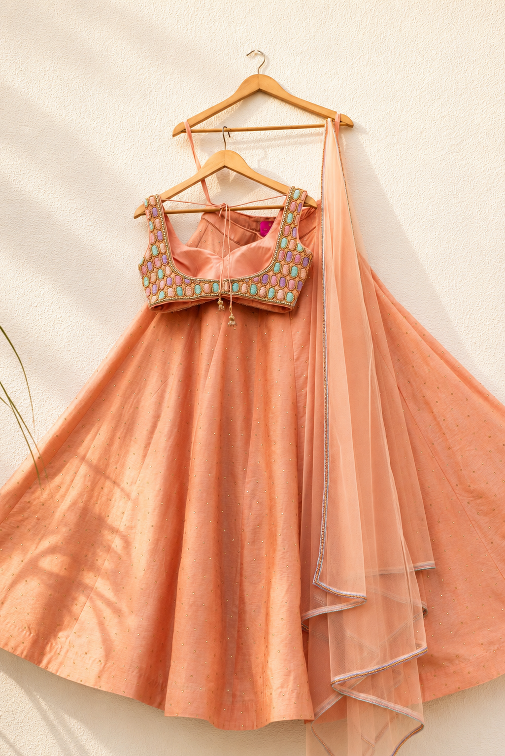 PEACH STONEWORK LEHENGA SET WITH MULTICOLOUR OVAL CUTDANA BLOUSE SET
