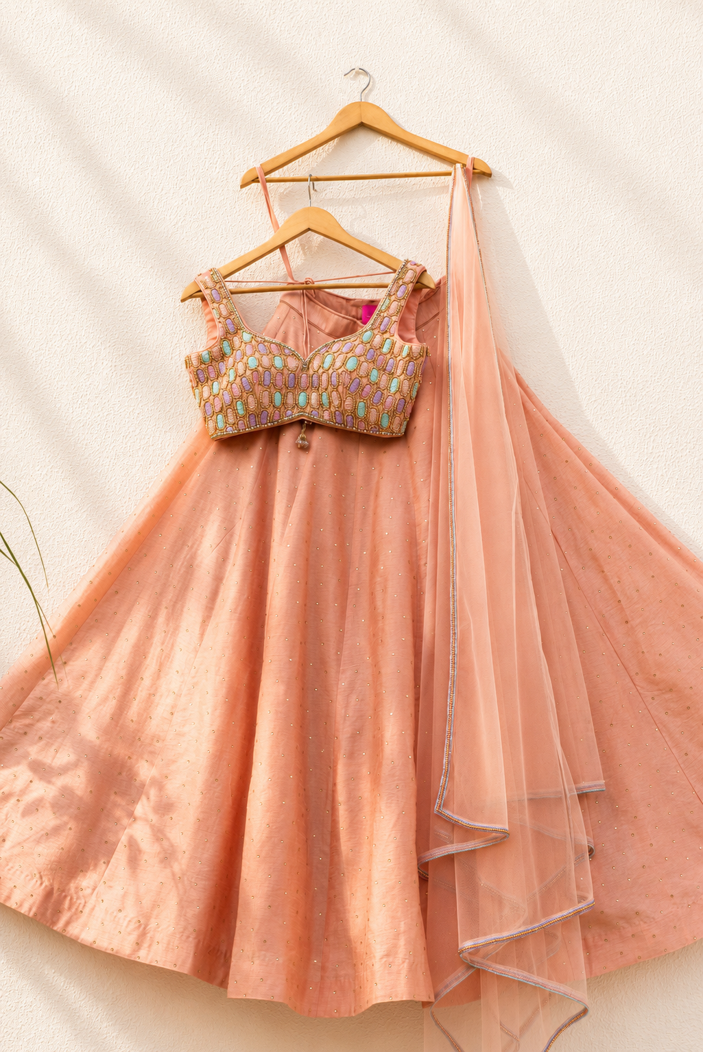 PEACH STONEWORK LEHENGA SET WITH MULTICOLOUR OVAL CUTDANA BLOUSE SET