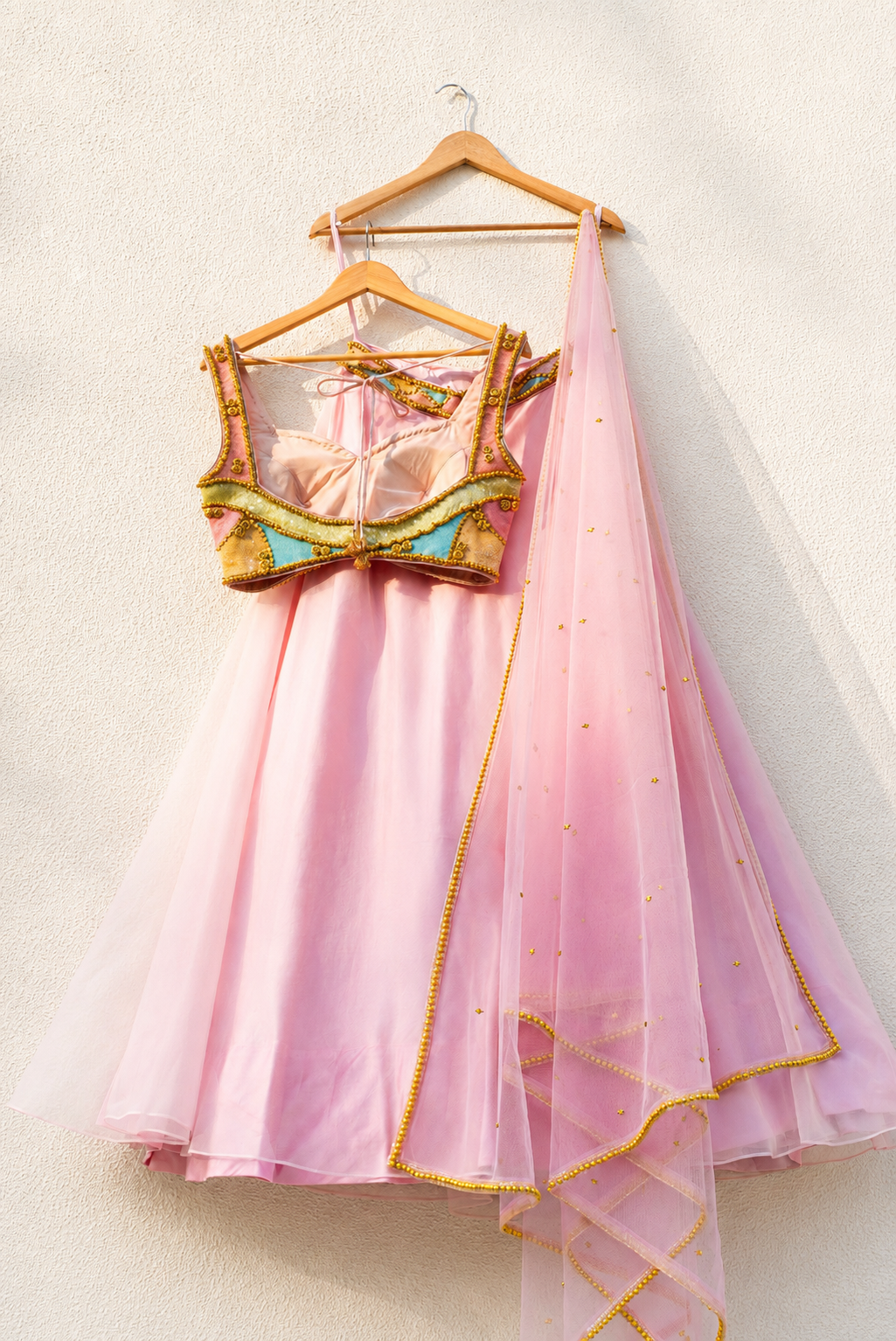 PINK ORGANZA LEHENGA WITH MULTICOLOUR CUTDANA BLOUSE